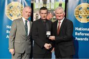 8 November 2014; Referee John Keane, from Galway, is presented with his Allianz Hurling League D2B 2014 referees' medal by Pat McEnaney, Chairman of National Referee Committee, left, and Frank Burke, Vice-President of the GAA. 2014 National Referees' Awards Banquet, Croke Park, Dublin. Picture credit: Barry Cregg / SPORTSFILE