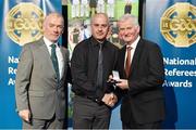 8 November 2014; Referee John Sexton, from Cork, is presented with his Senior Club Hurling 2013 referees' medal by Pat McEnaney, Chairman of National Referee Committee, left, and Frank Burke, Vice-President of the GAA. 2014 National Referees' Awards Banquet, Croke Park, Dublin. Picture credit: Barry Cregg / SPORTSFILE