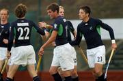 15 June 2007; Ireland's John Jermyn, centre, is congratulated by team-mates Phelie Maguire, left, Eugene Magee, and Iain Lewers, right, after scoring his side's first goal. Men's Setanta Sports Trophy, Ireland v Egypt, The National Hockey Stadium, University College Dublin, Belfield, Dublin. Picture credit: Brian Lawless / SPORTSFILE