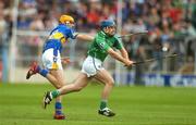 16 June 2007; Damien Reale, Limerick, in action against Shane McGrath, Tipperary. Guinness Munster Senior Hurling Championship Semi-Final Replay, Limerick v Tipperary, Semple Stadium, Thurles, Co. Tipperary. Picture credit: Pat Murphy / SPORTSFILE