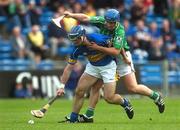 16 June 2007; Eoin Kelly, Tipperary, in action against Damien Reale, Limerick. Guinness Munster Senior Hurling Championship Semi-Final Replay, Limerick v Tipperary, Semple Stadium, Thurles, Co. Tipperary. Picture credit: Pat Murphy / SPORTSFILE