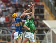 16 June 2007; Pa Bourke, Tipperary, in action against Stephen Lucey, Limerick. Guinness Munster Senior Hurling Championship Semi-Final Replay, Limerick v Tipperary, Semple Stadium, Thurles, Co. Tipperary. Picture credit: Pat Murphy / SPORTSFILE