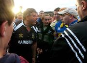 16 June 2007; Tipperary manager Michael 'Babs' Keating is confronted by a Tipperary supporter after the game ended in a draw. Guinness Munster Senior Hurling Championship Semi-Final Replay, Limerick v Tipperary, Semple Stadium, Thurles, Co. Tipperary. Picture credit: Pat Murphy / SPORTSFILE