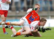 17 June 2007; Peter Hughes, Tyrone, in action against Ryan Conlon, Armagh. ESB Ulster Minor Football Championship Semi-Final, Tyrone v Armagh, St Tighearnach's Park, Clones, Co Monaghan. Photo by Sportsfile