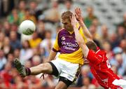 17 June 2007; Matty Forde, Wexford, in action against Jamie Carr, Louth. Bank of Ireland Leinster Senior Football Championship Quarter-Final, Louth v Wexford, Croke Park, Dublin. Picture credit: Pat Murphy / SPORTSFILE