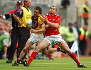 17 June 2007; Ciaran Deely, Wexford, in action against Paddy Keenan, Louth. Bank of Ireland Leinster Senior Football Championship Quarter-Final, Louth v Wexford, Croke Park, Dublin. Picture credit: Pat Murphy / SPORTSFILE