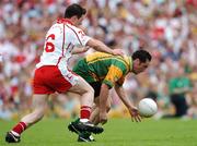 17 June 2007; Brendan Devenney, Donegal, in action against Conor Gormley, Tyrone. Bank of Ireland Ulster Senior Football Championship Semi-Final, Tyrone v Donegal, St Tighearnach's Park, Clones, Co Monaghan. Photo by Sportsfile