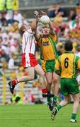 17 June 2007; Kevin Hughes, Tyrone, in action against Neil Gallagher, Donegal. Bank of Ireland Ulster Senior Football Championship Semi-Final, Tyrone v Donegal, St Tighearnach's Park, Clones, Co Monaghan. Picture credit: Oliver McVeigh / SPORTSFILE