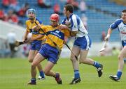 17 June 2007; Conor Hassett, Clare, in action against Brian Wall, Waterford. Munster Intermediate Hurling Championship Semi-Final, Clare v Waterford, Semple Stadium, Thurles, Co. Tipperary. Picture credit: Brendan Moran / SPORTSFILE