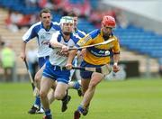 17 June 2007; Conor Hassett, Clare, in action against Shane Kearney, Waterford. Munster Intermediate Hurling Championship Semi-Final, Clare v Waterford, Semple Stadium, Thurles, Co. Tipperary. Picture credit: Brendan Moran / SPORTSFILE