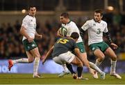 8 November 2014; Rob Kearney with support from his Ireland team-mates Jonathan Sexton, left, and Jared Payne, right, is tackled by Jan Serfontein, South Africa. Guinness Series, Ireland v South Africa, Aviva Stadium, Lansdowne Road, Dublin. Picture credit: Stephen McCarthy / SPORTSFILE