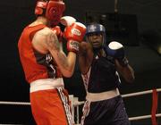 21 June 2007; France's Xavier Noel, Blue, in action against Romania's Radu Zarif. 5th European Union Boxing Championships, Welterweight 69kg Quarter-Final, Xavier Noel, France.v.Radu Zarif, Romania, National Stadium, Dublin. Picture credit: Matt Browne / SPORTSFILE