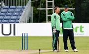 24 June 2007; Ireland captain Trent Johnston, right, with William Porterfield waiting for the start of play. One Day Cricket International, Ireland v South Africa, Stormont, Belfast, Co. Antrim. Picture credit: Oliver McVeigh / SPORTSFILE