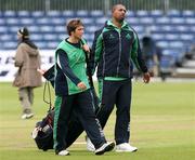 24 June 2007; Ireland coach Phil Simmons, right, and Ireland player Gary Kidd leave the pitch after pre-match practise. One Day Cricket International, Ireland v South Africa, Stormont, Belfast, Co. Antrim. Picture credit: Oliver McVeigh / SPORTSFILE