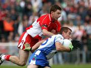 24 June 2007; Thomas Freeman, Monaghan, in action against Gerard O'Kane, Derry. Bank of Ireland Ulster Senior Football Championship Semi-Final, Derry v Monaghan, Casement Park, Belfast. Picture credit: Oliver McVeigh / SPORTSFILE