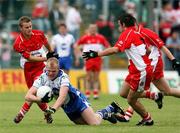 24 June 2007; Dick Clerkin, Monaghan, in action against Raymond Wilkinson and Michael McGoldrick, Derry. Bank of Ireland Ulster Senior Football Championship Semi-Final, Derry v Monaghan, Casement Park, Belfast. Picture credit: Oliver McVeigh / SPORTSFILE