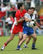 24 June 2007; Stephen Gollogly, Monaghan, in action against Liam Hinphey, Derry. Bank of Ireland Ulster Senior Football Championship Semi-Final, Derry v Monaghan, Casement Park, Belfast. Picture credit: Oliver McVeigh / SPORTSFILE