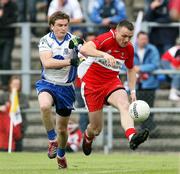 24 June 2007; Paddy Bradley, Derry, in action against Dessie Mone, Monaghan. Bank of Ireland Ulster Senior Football Championship Semi-Final, Derry v Monaghan, Casement Park, Belfast. Picture credit: Oliver McVeigh / SPORTSFILE