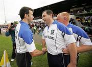 24 June 2007; Monaghan manager Seamus McEnaney, right, and his assistant Martin McElkennon congratulate each other at the final whistle. Bank of Ireland Ulster Senior Football Championship Semi-Final, Derry v Monaghan, Casement Park, Belfast. Picture credit: Oliver McVeigh / SPORTSFILE