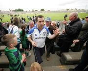 24 June 2007; Monaghan manager Seamus McEnaney takes the congratulations of his supporters after the game. Bank of Ireland Ulster Senior Football Championship Semi-Final, Derry v Monaghan, Casement Park, Belfast. Picture credit: Oliver McVeigh / SPORTSFILE
