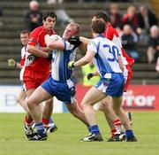 24 June 2007; Dick Clerkin, Monaghan, in action against Liam Hinphey and Enda Muldoon, Derry. Bank of Ireland Ulster Senior Football Championship Semi-Final, Derry v Monaghan, Casement Park, Belfast. Picture credit: Oliver McVeigh / SPORTSFILE