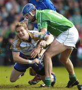24 June 2007; Tipperary goalkeeper Gerry Kennedy is tackled by Brian Begley, Limerick. Guinness Munster Senior Hurling Championship Semi-Final, 2nd Replay, Limerick v Tipperary, Gaelic Grounds, Limerick. Picture credit: Brendan Moran / SPORTSFILE