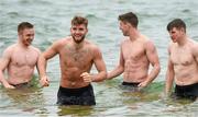 15 November 2014; Aidan O'Shea, Ross Munnelly, left,  Colm Begley and Darren Hughes during a 'beach recovery session' after training ahead of their International Rules Series warm up game against VFL All Stars on Sunday 16th. Ireland International Rules Squad Training, Sandringham beach, Melbourne, Victoria, Australia. Picture credit: Ray McManus / SPORTSFILE