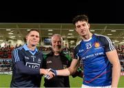 15 November 2014; Dublin 2013 captain Stephen Cluxton and Ulster Allstars XV team captain Niall McKeever shake hands before the game as Referee Pat McEneny looks on. #GameForAnto, Ulster Allstars XV v Dublin 2013 team, Kingspan Stadium, Ravenhill Park, Belfast, Co. Antrim. Picture credit: Oliver McVeigh / SPORTSFILE
