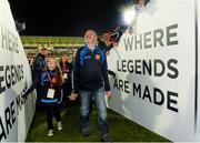 15 November 2014; Anto Finnegan, leaves the field along with his 10 year old daughter Ava after the game. #GameForAnto, Ulster Allstars XV v Dublin 2013 team, Kingspan Stadium, Ravenhill Park, Belfast, Co. Antrim. Picture credit: Oliver McVeigh / SPORTSFILE