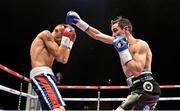15 November 2014; Anthony Crolla, right, exchanges punches with Gyorgy Mizei Jnr during their lightweight bout. Return of The Mack, 3Arena, Dublin. Picture credit: Ramsey Cardy / SPORTSFILE