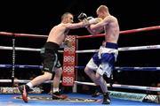 15 November 2014; John Joe Nevin, left, exchanges punches with Jack Heath during their featherweight bout. Return of The Mack, 3Arena, Dublin. Picture credit: Ramsey Cardy / SPORTSFILE