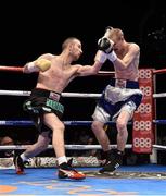 15 November 2014; John Joe Nevin, left, exchanges punches with Jack Heath during their featherweight bout. Return of The Mack, 3Arena, Dublin. Picture credit: Ramsey Cardy / SPORTSFILE