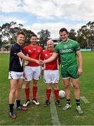 16 November 2014; Ben Jolley, the VFL Selection captain, shakes hands with Michael Murphy, the Ireland captain, as referees Simon Meredith and Marty Duffy look on. VFL Selection v Ireland - International Rules warm-up match, Sandringham VFL Ground, Trevor Barker Beach Oval, Melbourne, Victoria, Australia. Picture credit: Ray McManus / SPORTSFILE