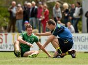 16 November 2014; Eamonn O'Muirchearthaigh, the Ireland chartered physiotherapist attends to Colm O'Neill. VFL Selection v Ireland - International Rules warm-up match, Sandringham VFL Ground, Trevor Barker Beach Oval, Melbourne, Victoria, Australia. Picture credit: Ray McManus / SPORTSFILE