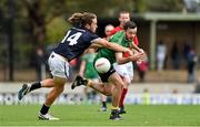 16 November 2014; Kevin McLoughlin, Ireland, is tackled by Jackson Geary, VFL Selection. VFL Selection v Ireland - International Rules warm-up match, Sandringham VFL Ground, Trevor Barker Beach Oval, Melbourne, Victoria, Australia. Picture credit: Ray McManus / SPORTSFILE
