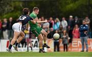 16 November 2014; Ross Munnelly, Ireland, is tackled by Jye Bolton, VFL Selection, as he shoots a score. VFL Selection v Ireland - International Rules warm-up match, Sandringham VFL Ground, Trevor Barker Beach Oval, Melbourne, Victoria, Australia. Picture credit: Ray McManus / SPORTSFILE