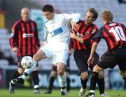 25 June 2007; Paul McCarthy, Waterford United, in action against Kevin Hunt and John Paul Kelly, 10, Bohemians. eircom League Premier Division, Bohemians v Waterford United, Dalymount Park, Dublin. Picture credit: Pat Murphy / SPORTSFILE