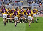 17 June 2007; Philip Wallace, 3, Colm Morris, 2, and Redmond Barry make their way to join their Wexford team-mates for the team photograph. Bank of Ireland Leinster Senior Football Championship Quarter-Final, Louth v Wexford, Croke Park, Dublin. Picture credit: Ray McManus / SPORTSFILE