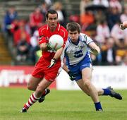 24 June 2007; Sean Martin Lockhart, Derry, in action against Shane Smith, Monaghan. Bank of Ireland Ulster Senior Football Championship Semi-Final, Derry v Monaghan, Casement Park, Belfast, Co. Antrim. Picture credit: Oliver McVeigh / SPORTSFILE