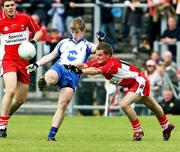 24 June 2007; Donal Morgan, Monaghan, in action against Raymond Wilkinson, Derry. Bank of Ireland Ulster Senior Football Championship Semi-Final, Derry v Monaghan, Casement Park, Belfast, Co. Antrim. Picture credit: Oliver McVeigh / SPORTSFILE