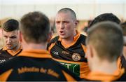 16 November 2014; Kieran Donaghy, Austin Stacks, speaks to his team-mates as they huddle together during half-time of extra time. AIB Munster GAA Football Senior Club Championship Semi-Final, Austin Stacks v Ballincollig, Austin Stack Park, Tralee, Co. Kerry. Picture credit: Diarmuid Greene / SPORTSFILE