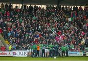 16 November 2014; The Ballincollig team huddle together in front of their supporters before the start of extra time. AIB Munster GAA Football Senior Club Championship Semi-Final, Austin Stacks v Ballincollig, Austin Stack Park, Tralee, Co. Kerry. Picture credit: Diarmuid Greene / SPORTSFILE