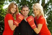 26 June 2007; Leading bookmaker, Ladbrokes has announced that it is to sponsor Ireland’s boxing sensation, Bernard Dunne.  The deal makes Ladbrokes an official sponsor of the EBU European Super Bantamweight champion and was announced at the new state-of-the-art Ladbrokes concept store in Ballsbridge, Dublin. Pictured with Bernard at the announcement are Jenny Lee Masterson, left, and Pippa O'Connor. Ladbrokes Store, Merrion Road, Ballsbridge.  Picture credit: Brendan Moran / SPORTSFILE