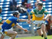 30 June 2007; Sean Ryan, Offaly, in action against Eamonn Buckley, Tipperary. Guinness All-Ireland Hurling Championship Qualifier, Group 1B, Round 1, Tipperary v Offaly, Semple Stadium, Thurles, Co. Tipperary. Photo by Sportsfile