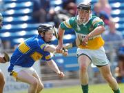 30 June 2007; Sean Ryan, Offaly, in action against Eamonn Buckley, Tipperary. Guinness All-Ireland Hurling Championship Qualifier, Group 1B, Round 1, Tipperary v Offaly, Semple Stadium, Thurles, Co. Tipperary. Photo by Sportsfile