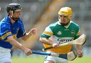 30 June 2007; Brian Carroll, Offaly, in action against Shane McGrath, Tipperary. Guinness All-Ireland Hurling Championship Qualifier, Group 1B, Round 1, Tipperary v Offaly, Semple Stadium, Thurles, Co. Tipperary. Photo by Sportsfile