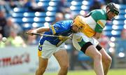 30 June 2007; Willie Ryan, Tipperary, in action against Paul Cleary, Offaly. Guinness All-Ireland Hurling Championship Qualifier, Group 1B, Round 1, Tipperary v Offaly, Semple Stadium, Thurles, Co. Tipperary. Photo by Sportsfile