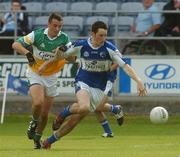 30 June 2007; Conor Meredith, Laois, in action against Mark Young, Offaly. ESB Leinster Minor Football Championship Semi-Final, Laois v Offaly, O'Moore Park, Portlaoise, Co. Laois. Picture credit: Pat Murphy / SPORTSFILE