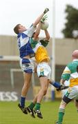 30 June 2007; Sean Ramsbottom, Laois, in action against Colin Egan, Offaly. ESB Leinster Minor Football Championship Semi-Final, Laois v Offaly, O'Moore Park, Portlaoise, Co. Laois. Picture credit: Pat Murphy / SPORTSFILE