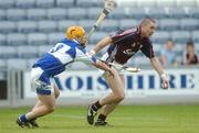 30 June 2007; Eugene Cloonan, Galway, in action against Cahir Healy, Laois. Guinness All-Ireland Hurling Championship Qualifier, Laois v Galway, O'Moore Park, Portlaoise, Co. Laois. Picture credit: Pat Murphy / SPORTSFILE